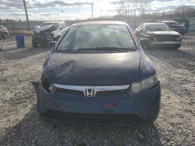 Photo 5 from auction – 2006 HONDA CIVIC LX with VIN JHMFA15576S001093