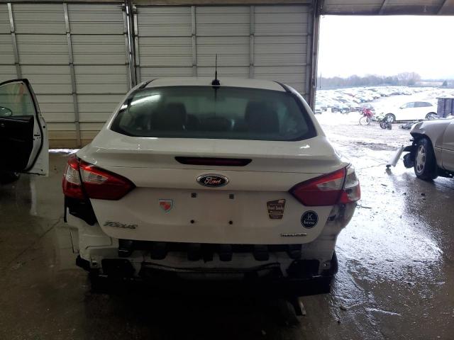 Photo 6 from auction – 2014 FORD FOCUS S with VIN 1FADP3E26EL220280