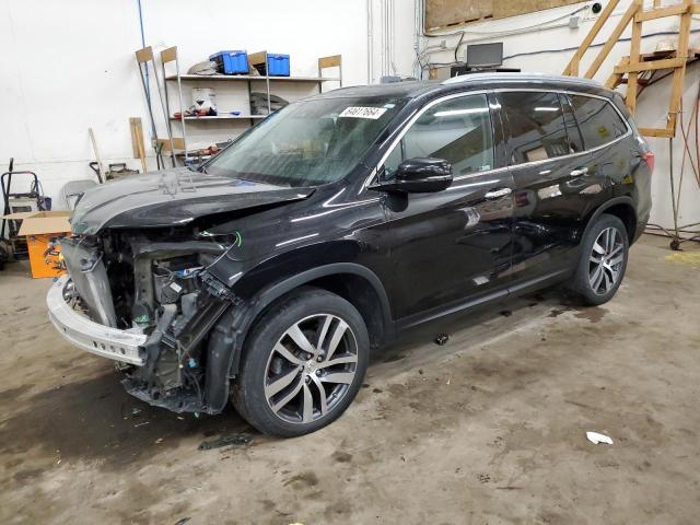 HONDA PILOT ELIT 2018 with VIN 5FNYF6H06JB057282 - Photo from auction
