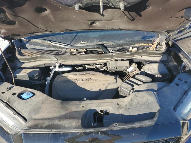Photo 12 from auction – 2022 HONDA PASSPORT E with VIN 5FNYF8H01NB023932