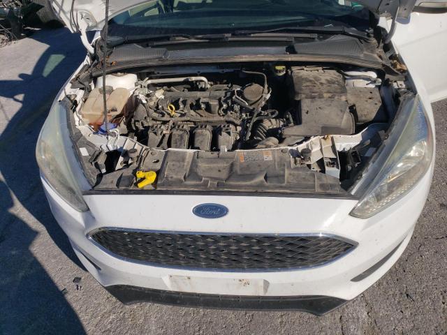 Photo 11 from auction – 2015 FORD FOCUS SE with VIN 1FADP3F24FL343995