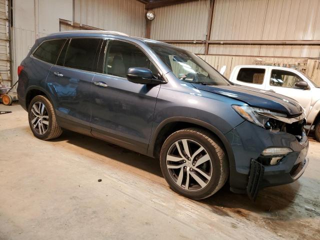 Photo 4 from auction – 2018 HONDA PILOT ELIT with VIN 5FNYF6H00JB032636