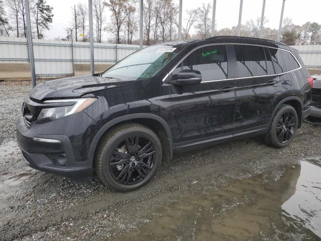 HONDA PILOT SE 2021 with VIN 5FNYF5H25MB022149 - Photo from auction