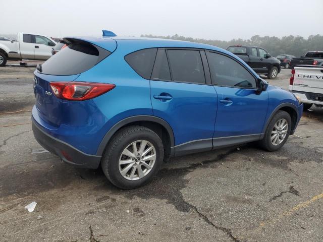 Photo 3 from auction – 2014 MAZDA CX-5 TOURI with VIN JM3KE2CY9E0320908