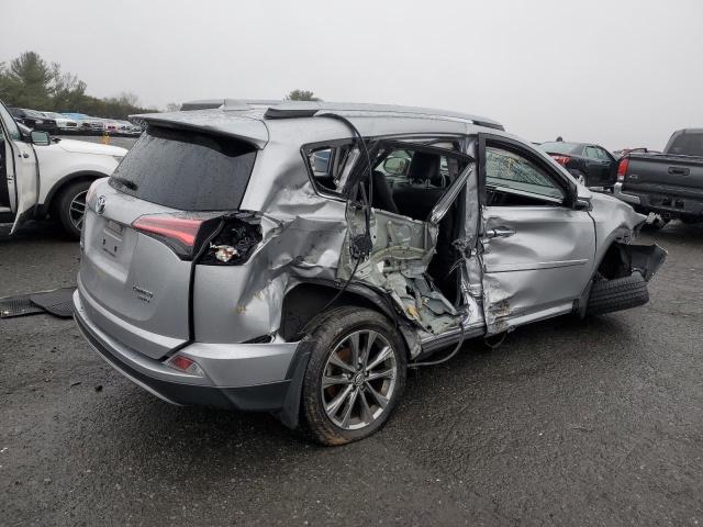 Photo 3 from auction – 2018 TOYOTA RAV4 LIMIT with VIN JTMDFREV3JJ242379