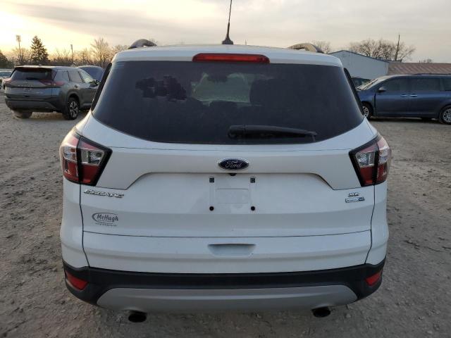 Photo 6 from auction – 2018 FORD ESCAPE SE with VIN 1FMCU9GD2JUC33771