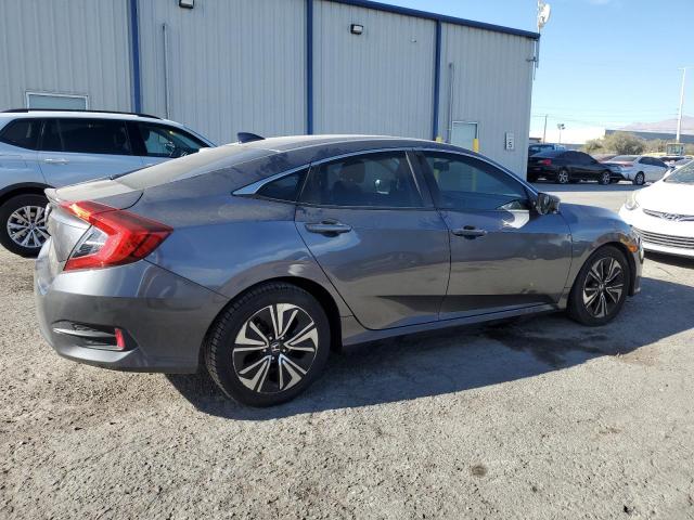 Photo 3 from auction – 2018 HONDA CIVIC EX with VIN JHMFC1F39JX042196