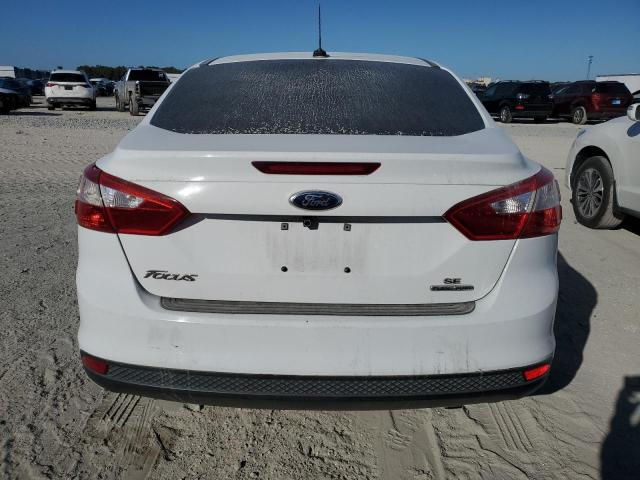 Photo 6 from auction – 2014 FORD FOCUS SE with VIN 1FADP3F20EL253581