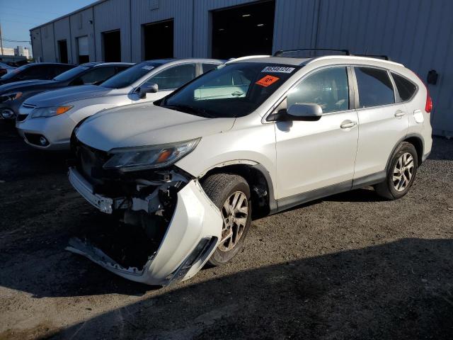 Photo 1 from auction – 2015 HONDA CR-V EXL with VIN 5J6RM4H79FL017403