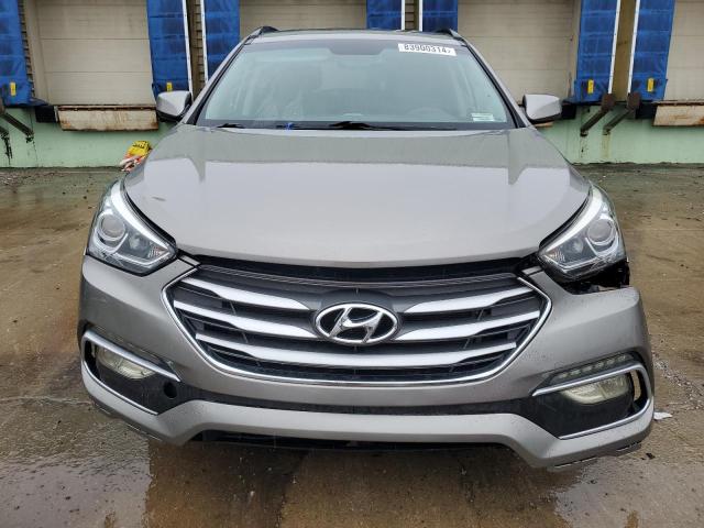 Photo 5 from auction – 2017 HYUNDAI SANTA FE S with VIN 5NMZU3LB5HH002140
