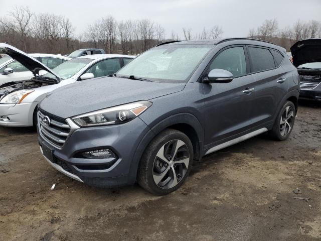 HYUNDAI TUCSON VAL 2018 with VIN KM8J3CA25JU781424 - Photo from auction