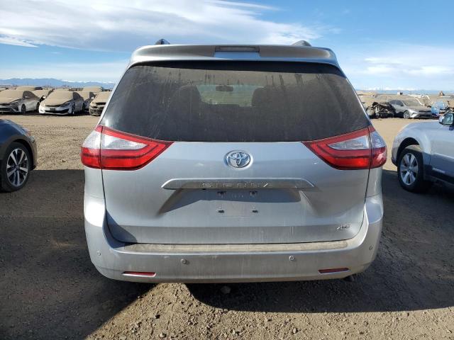 Photo 6 from auction – 2015 TOYOTA SIENNA XLE with VIN 5TDYK3DCXFS673452