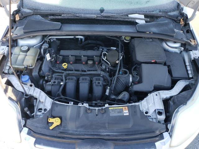 Photo 11 from auction – 2014 FORD FOCUS S with VIN 1FADP3E25EL443510