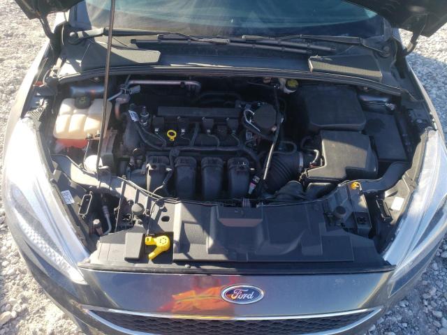 Foto 11 de la subasta – 2015 FORD FOCUS SE con VIN 1FADP3K23FL238645