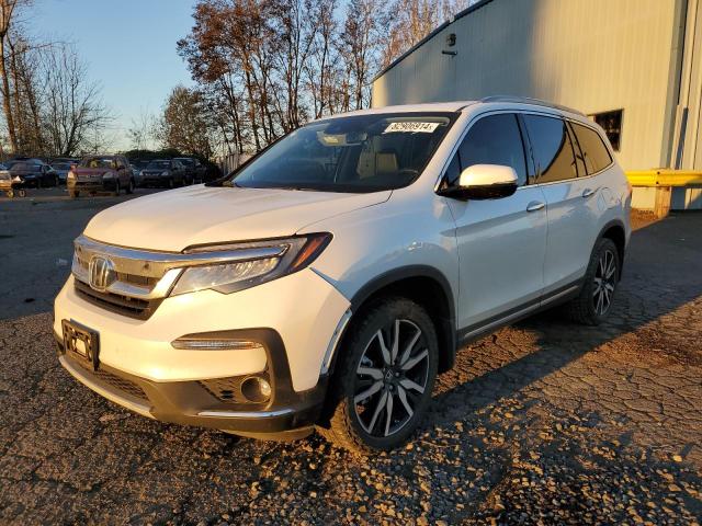 Photo 1 from auction – 2021 HONDA PILOT TOUR with VIN 5FNYF6H67MB086301