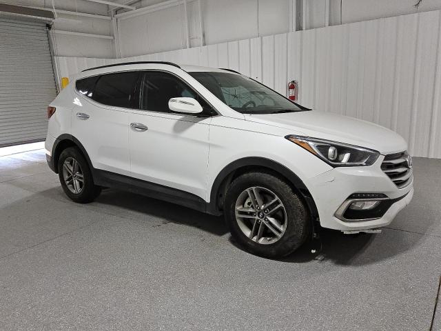 Photo 4 from auction – 2017 HYUNDAI SANTA FE S with VIN 5NMZU3LB3HH028350