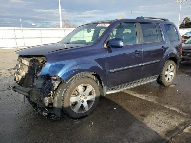 HONDA PILOT TOUR 2014 with VIN 5FNYF4H90EB030054 - Photo from auction
