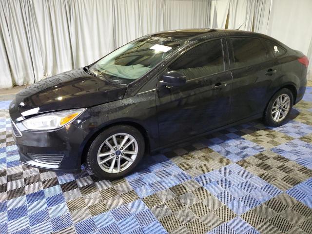 FORD FOCUS SE 2018 with VIN 1FADP3FE6JL205779 - Photo from auction