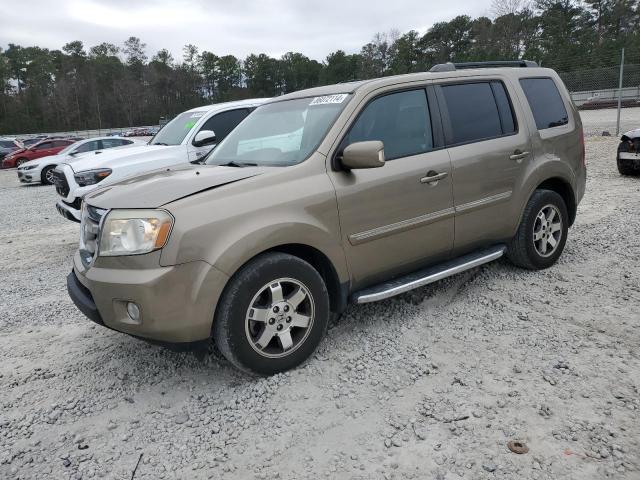 HONDA PILOT TOUR 2011 with VIN 5FNYF3H97BB024774 - Photo from auction