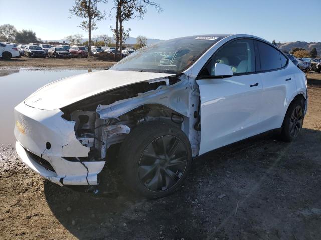 TESLA MODEL Y 2024 with VIN 7SAYGDED5RF117818 - Photo from auction
