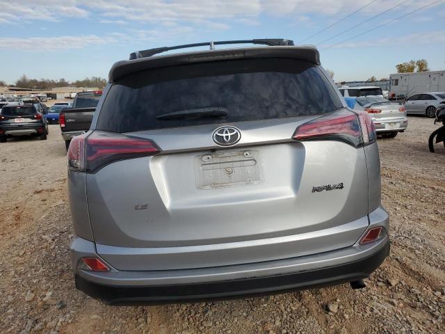Photo 6 from auction – 2018 TOYOTA RAV4 LE with VIN JTMZFREV5JJ178349