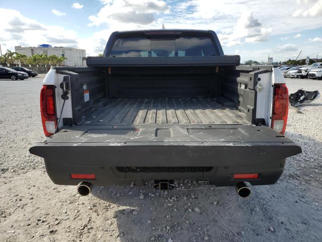 Photo 6 from auction – 2024 HONDA RIDGELINE with VIN 5FPYK3F86RB001669