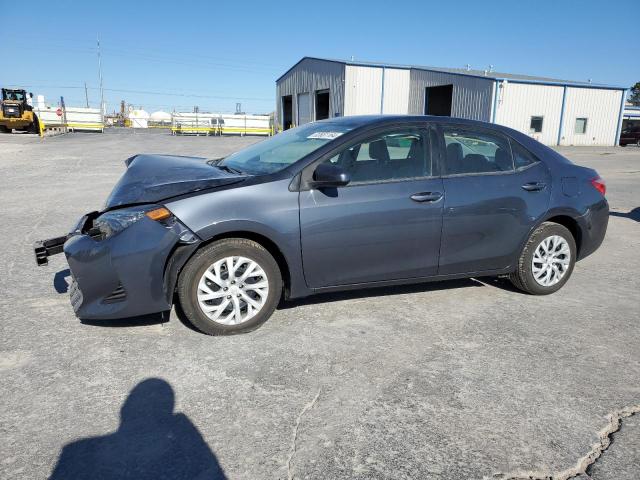 TOYOTA COROLLA L 2019 with VIN 5YFBURHE3KP858749 - Photo from auction