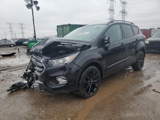 FORD ESCAPE TIT 2017 with VIN 1FMCU0J97HUE87731 - Photo from auction