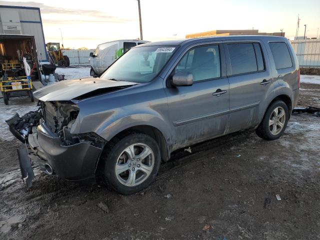 HONDA PILOT EXL 2014 with VIN 5FNYF4H57EB033871 - Photo from auction