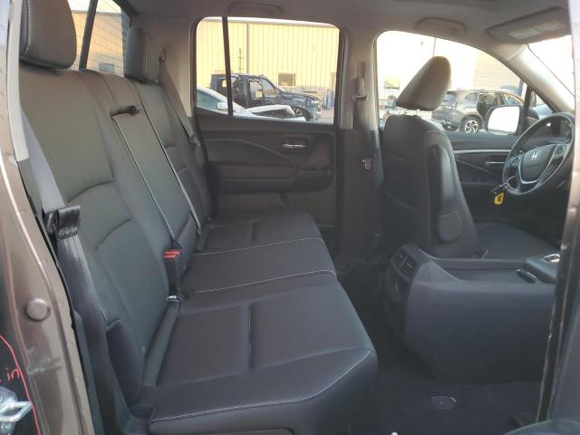 Photo 10 from auction – 2023 HONDA RIDGELINE with VIN 5FPYK3F56PB009726