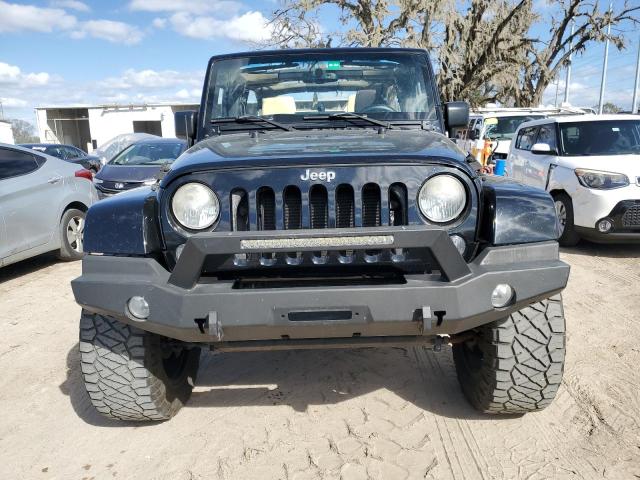Photo 5 from auction – 2015 JEEP WRANGLER U with VIN 1C4BJWEG8FL529623