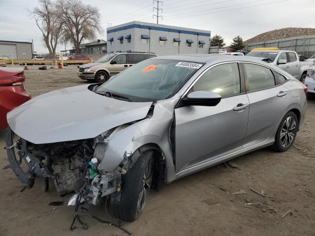 HONDA CIVIC EX 2018 with VIN JHMFC1F34JX022714 - Photo from auction