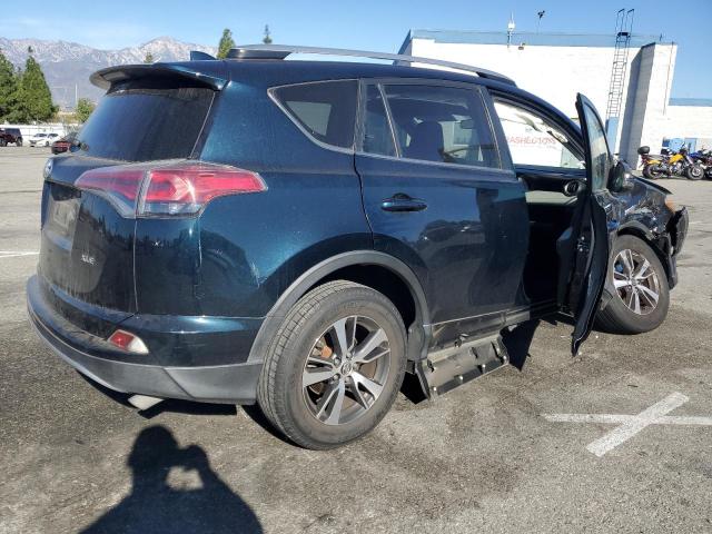 Photo 3 from auction – 2017 TOYOTA RAV4 XLE with VIN JTMWFREV7HD103129