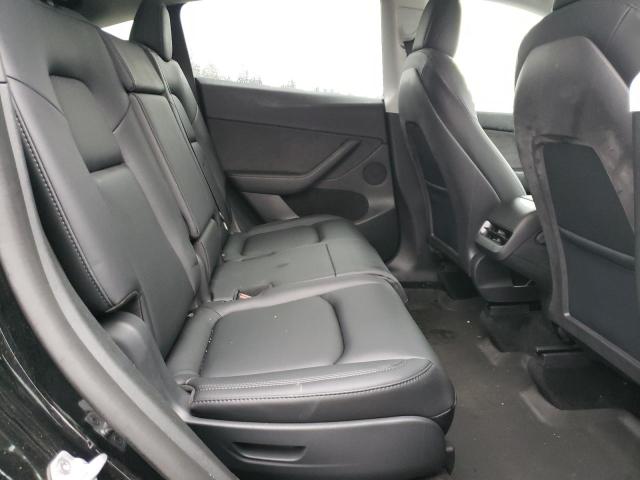 Photo 10 from auction – 2023 TESLA MODEL Y with VIN 7SAYGAEE2PF595473
