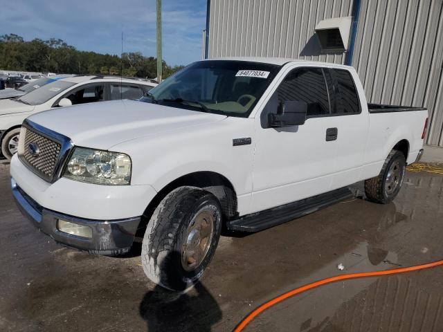 FORD F150 2004 with VIN 1FTRX12W44NB61860 - Photo from auction