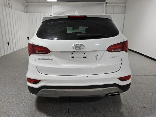 Photo 6 from auction – 2017 HYUNDAI SANTA FE S with VIN 5NMZU3LB3HH028350