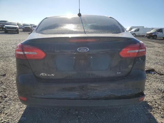 Photo 6 from auction – 2018 FORD FOCUS SE with VIN 1FADP3F2XJL257261