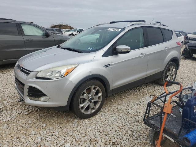 FORD ESCAPE TIT 2014 with VIN 1FMCU0J94EUC67734 - Photo from auction