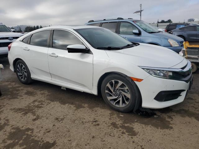 Photo 4 from auction – 2018 HONDA CIVIC EX with VIN 19XFC2F72JE209881
