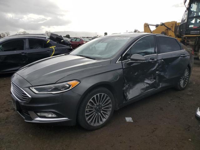 FORD FUSION TIT 2017 with VIN 3FA6P0SU5HR354703 - Photo from auction