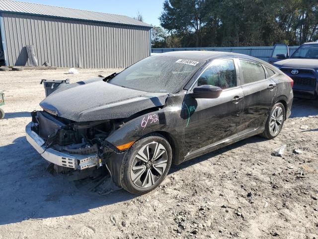 HONDA CIVIC EX 2017 with VIN 19XFC1F39HE014457 - Photo from auction