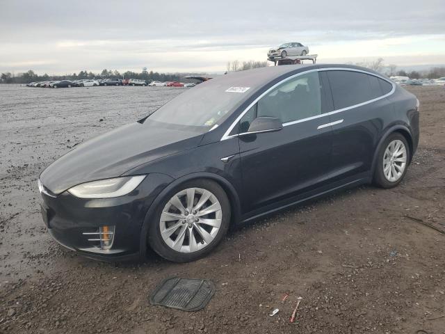 TESLA MODEL X 2017 with VIN 5YJXCDE2XHF049355 - Photo from auction