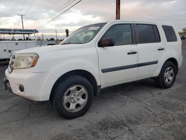 HONDA PILOT LX 2011 with VIN 5FNYF3H21BB018052 - Photo from auction