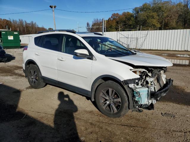 Photo 4 from auction – 2017 TOYOTA RAV4 XLE with VIN JTMRFREV7HD216186
