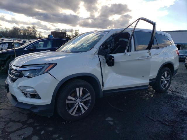 HONDA PILOT EX 2018 with VIN 5FNYF6H34JB040958 - Photo from auction