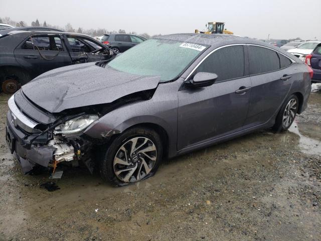 HONDA CIVIC EX 2018 with VIN 2HGFC2F77JH524438 - Photo from auction