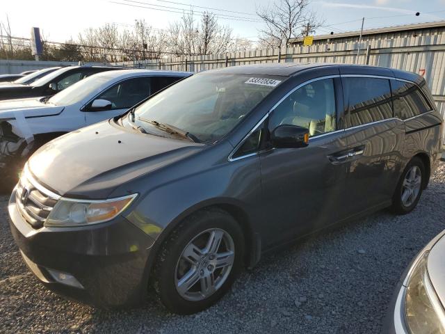 Photo 1 from auction – 2011 HONDA ODYSSEY TO with VIN 5FNRL5H94BB072676