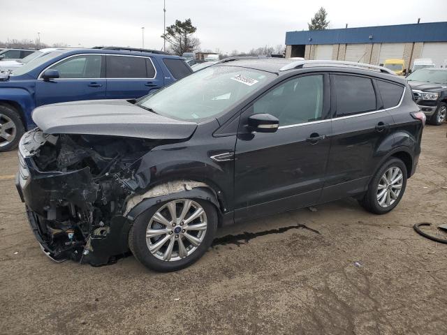 FORD ESCAPE TIT 2017 with VIN 1FMCU9J91HUD88276 - Photo from auction