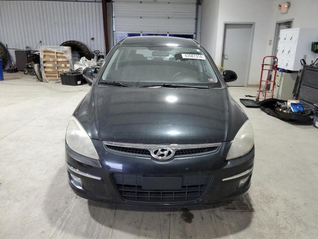 Photo 5 from auction – 2009 HYUNDAI ELANTRA TO with VIN KMHDC86E89U034604