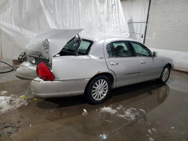 Photo 3 from auction – 2004 LINCOLN TOWN CAR E with VIN 1LNHM81W24Y665543